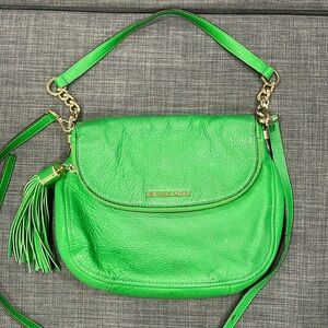 Michael Kors cross body leather bag in green.
